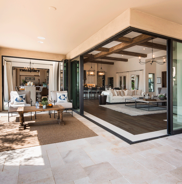 Milgard AX650 aluminum moving glass wall in a modern living space